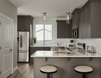 Kitchen in the Aurora showhome by Alquinn Homes in Woodbend, Leduc.