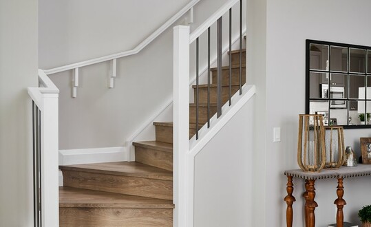 Staircase in the Aurora showhome by Alquinn Homes in Woodbend, Leduc.